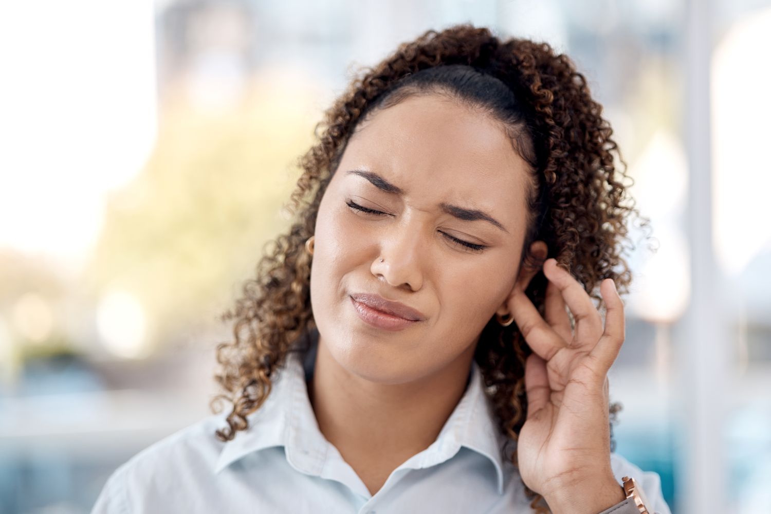 woman with ear pain